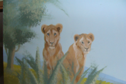 ציור קיר של אריות בחדר ילדים